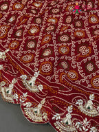 lehenga flare detailing of red pure dola silk bandhani lehenga chunni