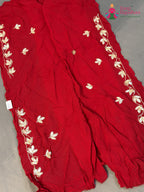 border detail of red pure dola silk bandhani lehenga chunni