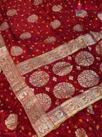 chunni detail of red pure dola silk bandhani lehenga chunni