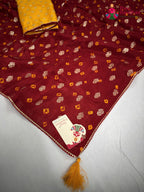 pallu detailing of red pure dola silk bandhani saree