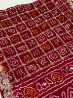 border detail of red pure gaji silk gota patti saree