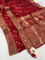 close up detailing of red pure ho silk banarasi zari weave saree