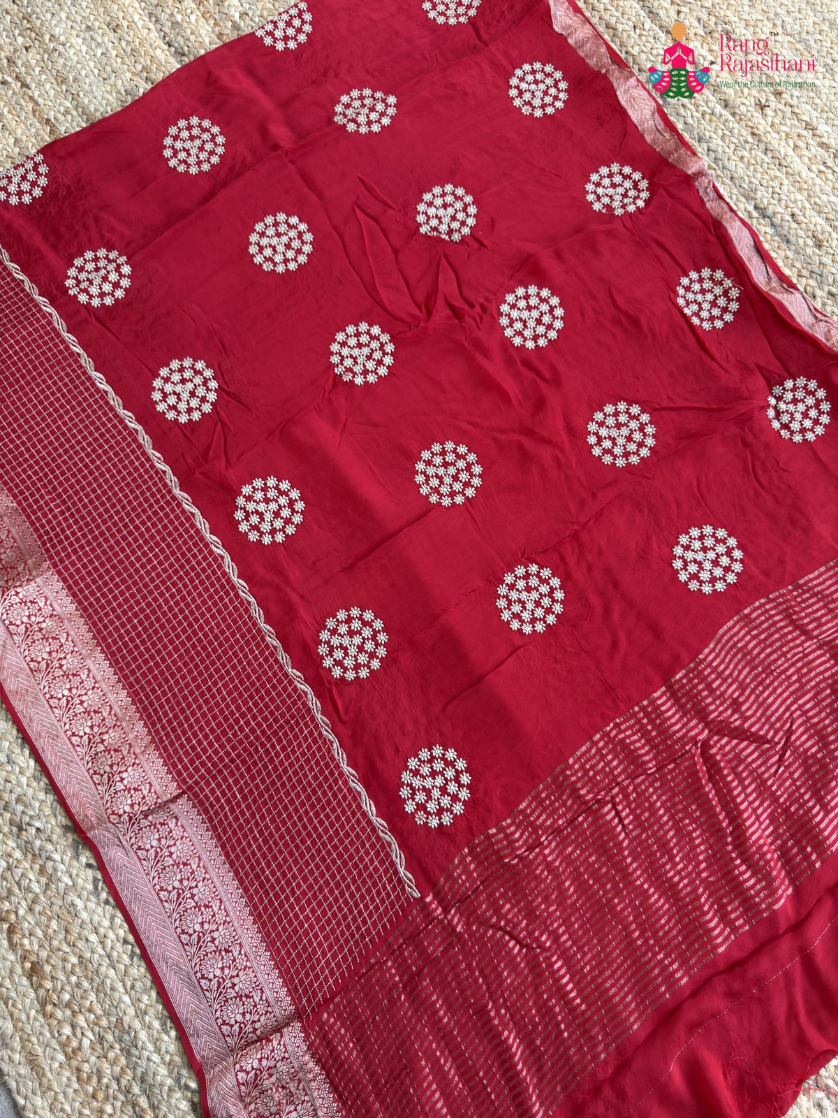 pallu detailing of red pure ho silk zari embroidery saree
