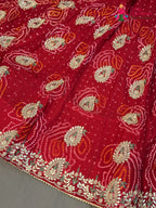 lehenga flare detailing of red pure ojariya bandhani lehenga chunni