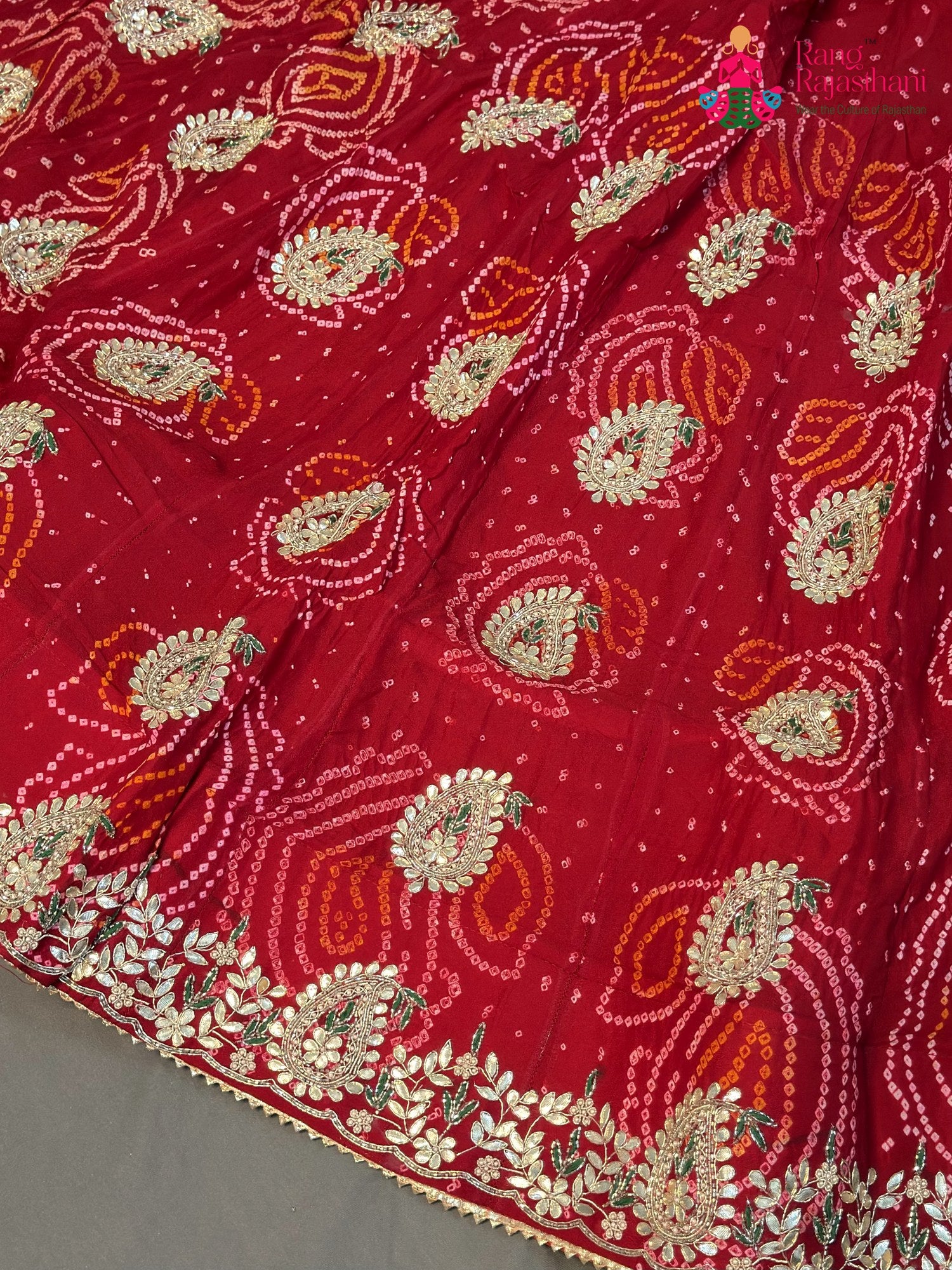 lehenga flare detailing of red pure ojariya bandhani lehenga chunni