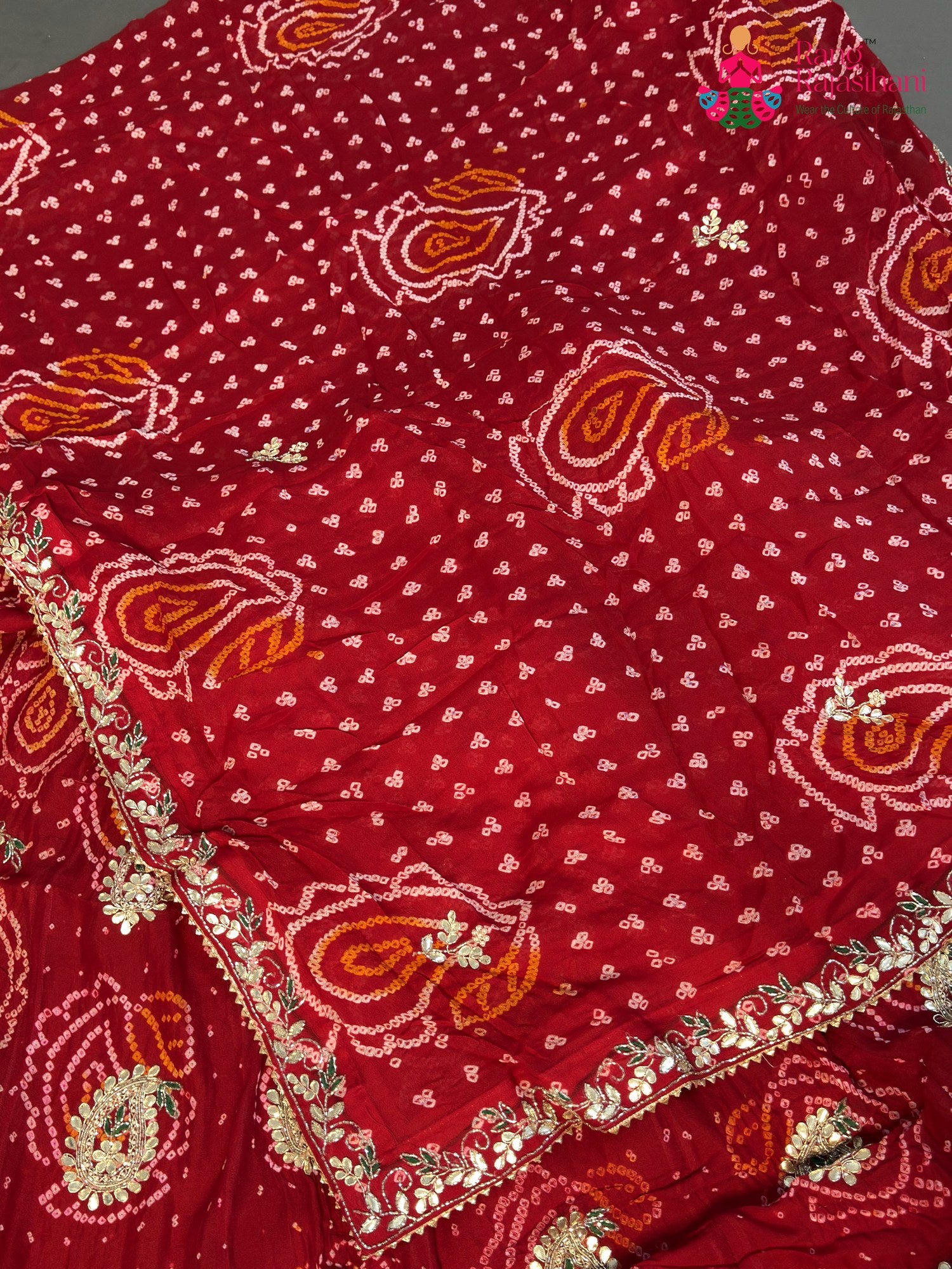chunni detail of red pure ojariya bandhani lehenga chunni