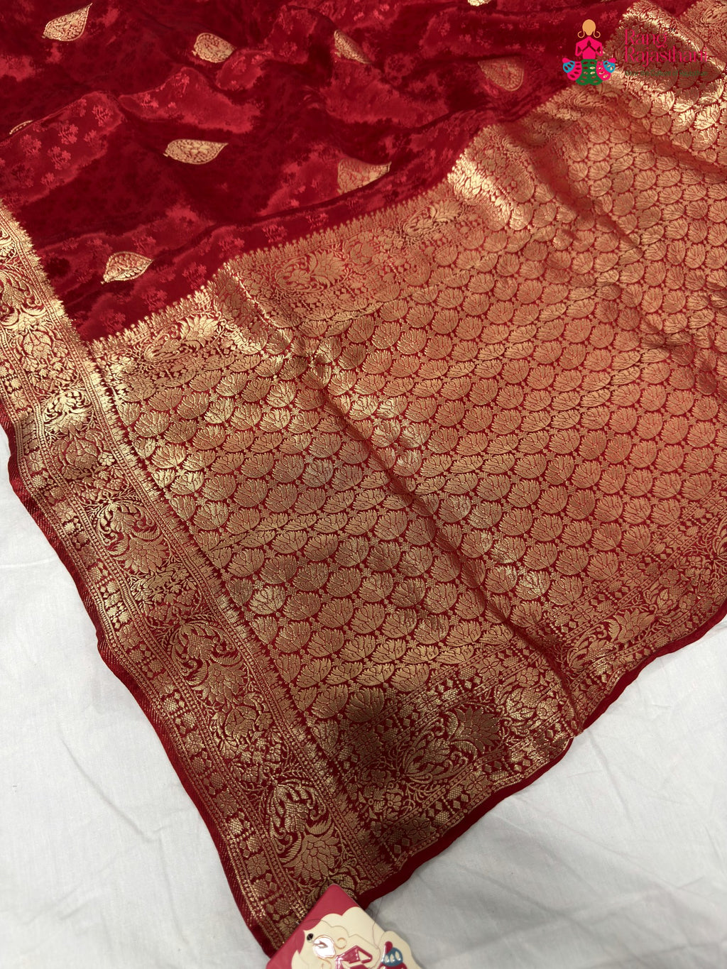 pallu detailing of red pure russian silk banarasi zari weave saree
