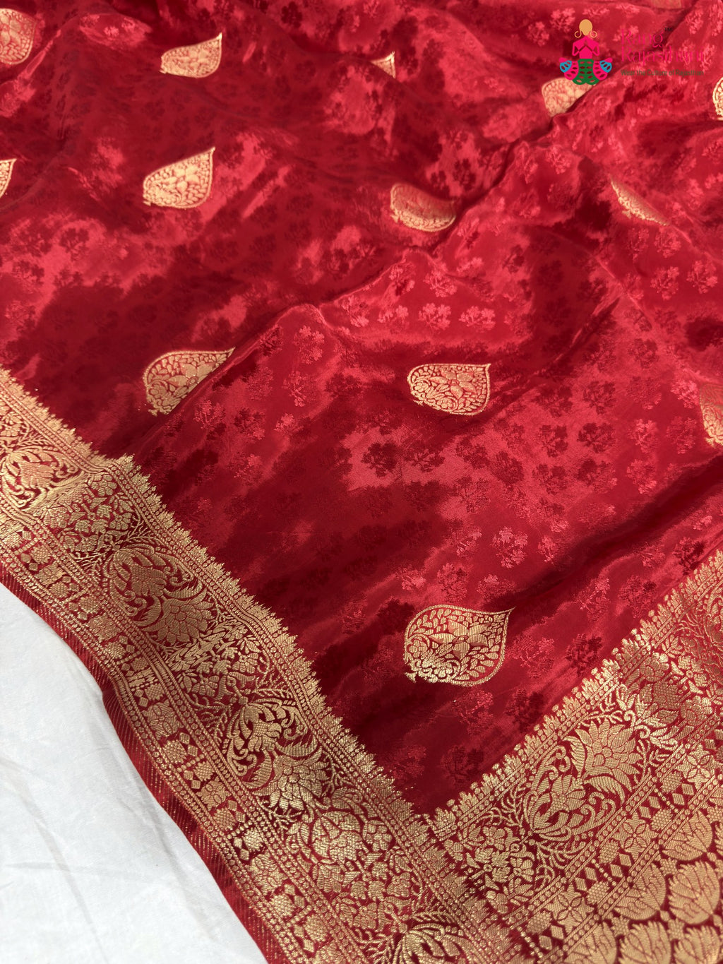 close up detailing of red pure russian silk banarasi zari weave saree