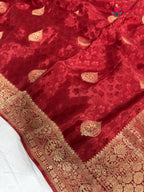 close up detailing of red pure russian silk banarasi zari weave saree