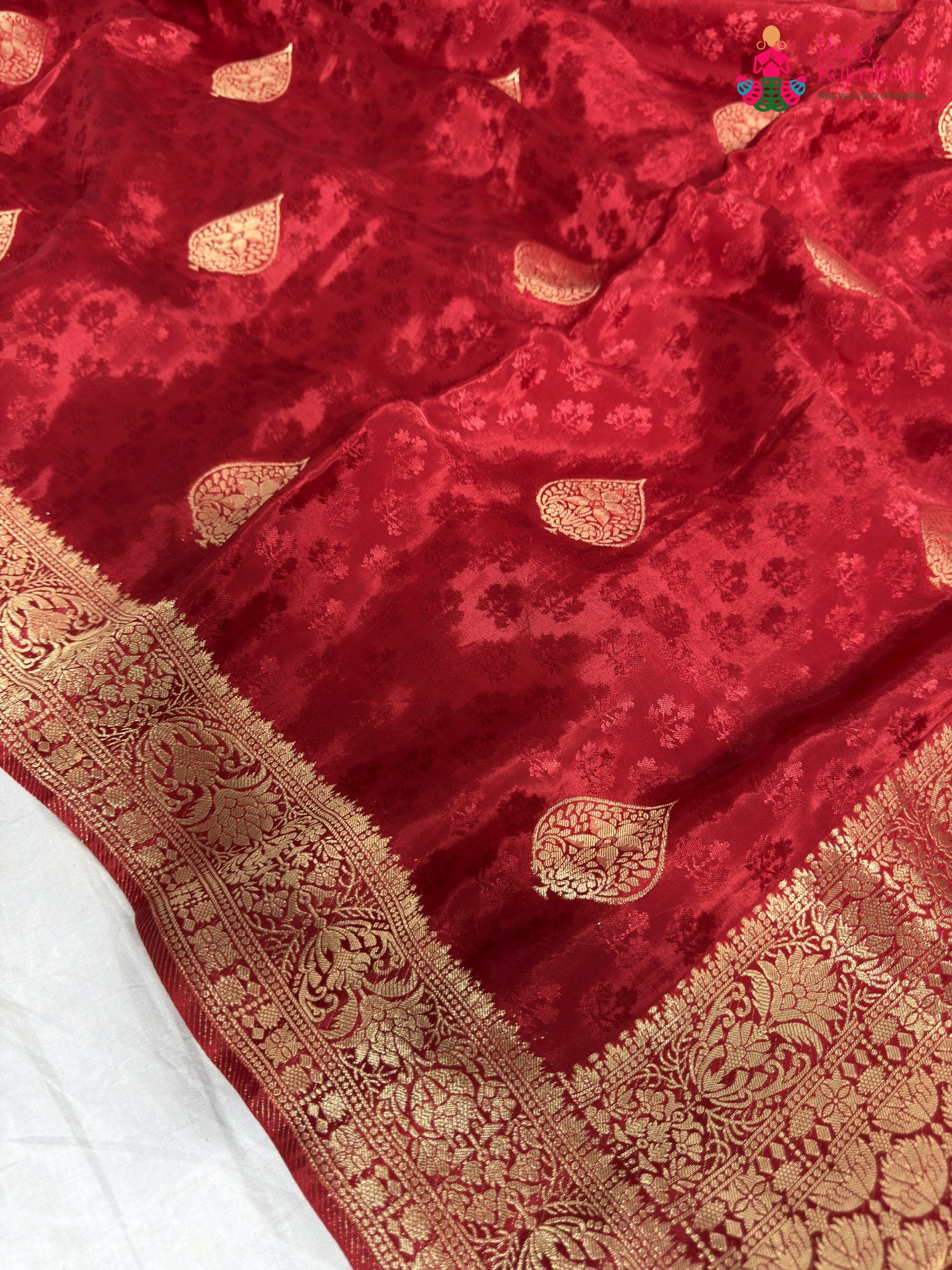 close up detailing of red pure russian silk banarasi zari weave saree