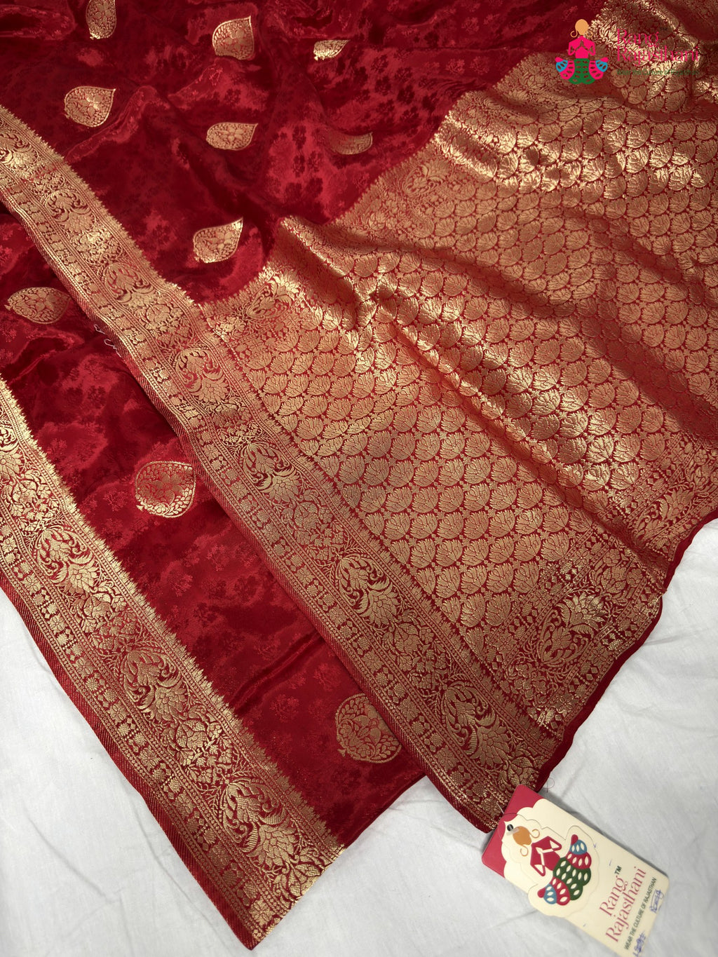 border detailing of red pure russian silk banarasi zari weave saree