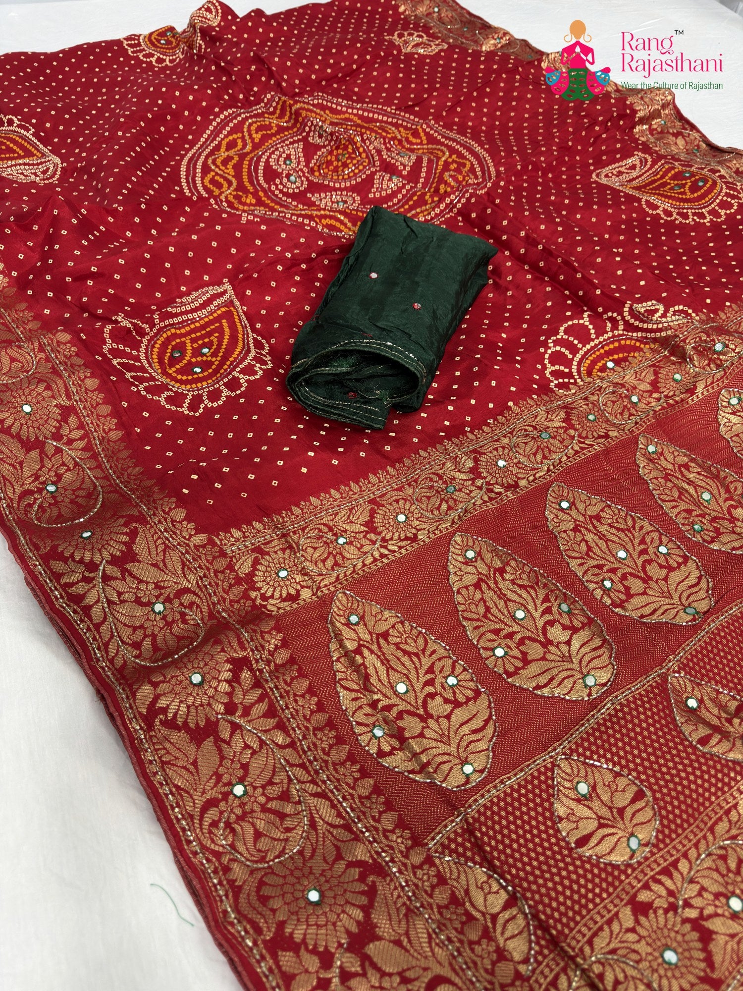 pallu detailing of red pure russian silk bandhani saree