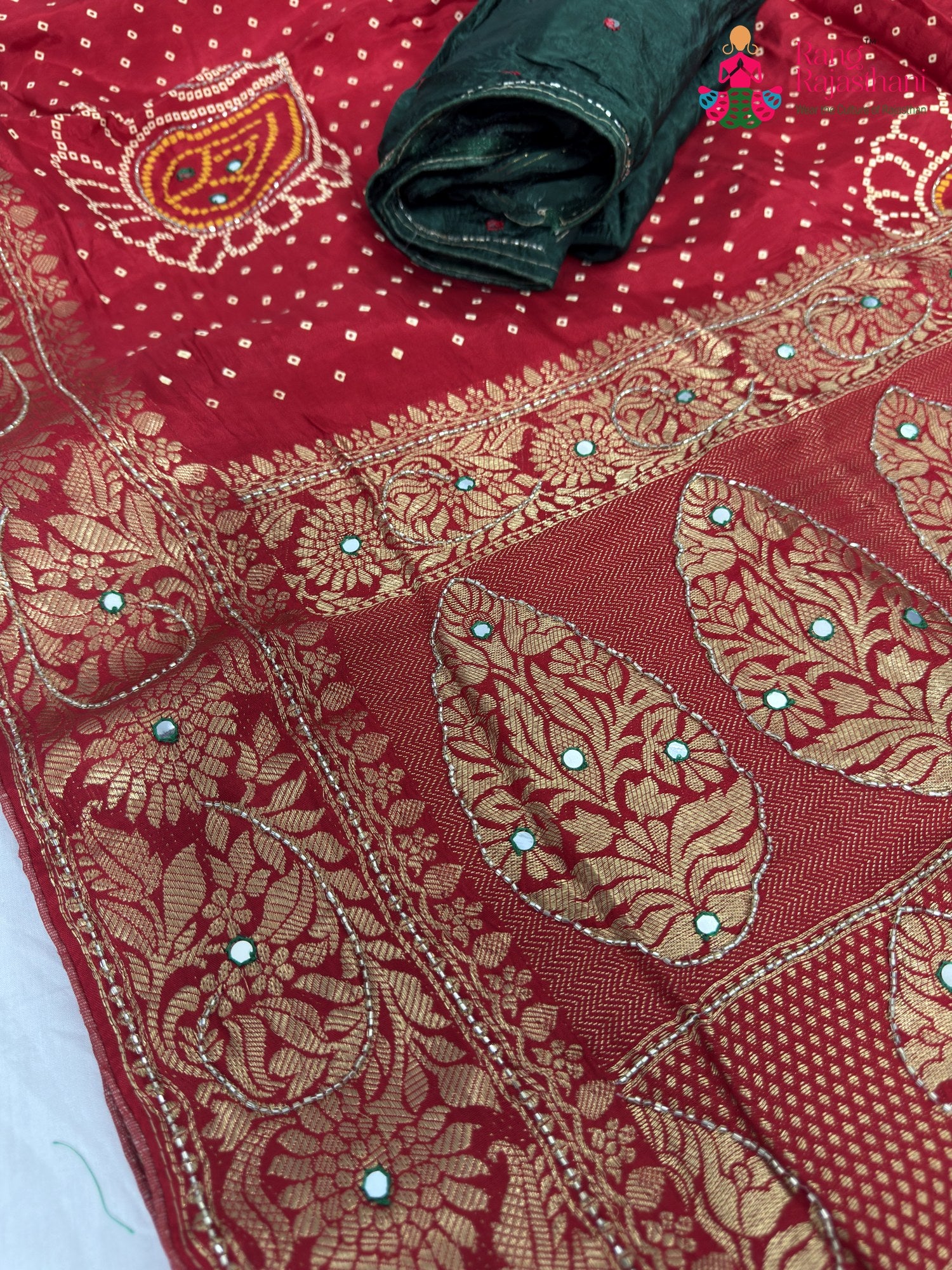 close up detailing of red pure russian silk bandhani saree