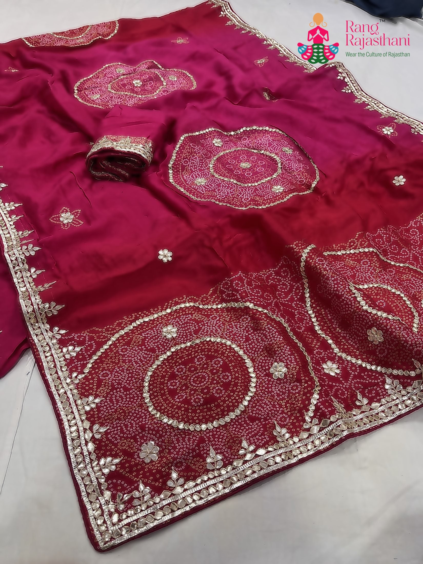 close up detailing of red pure russian silk gota patti saree 