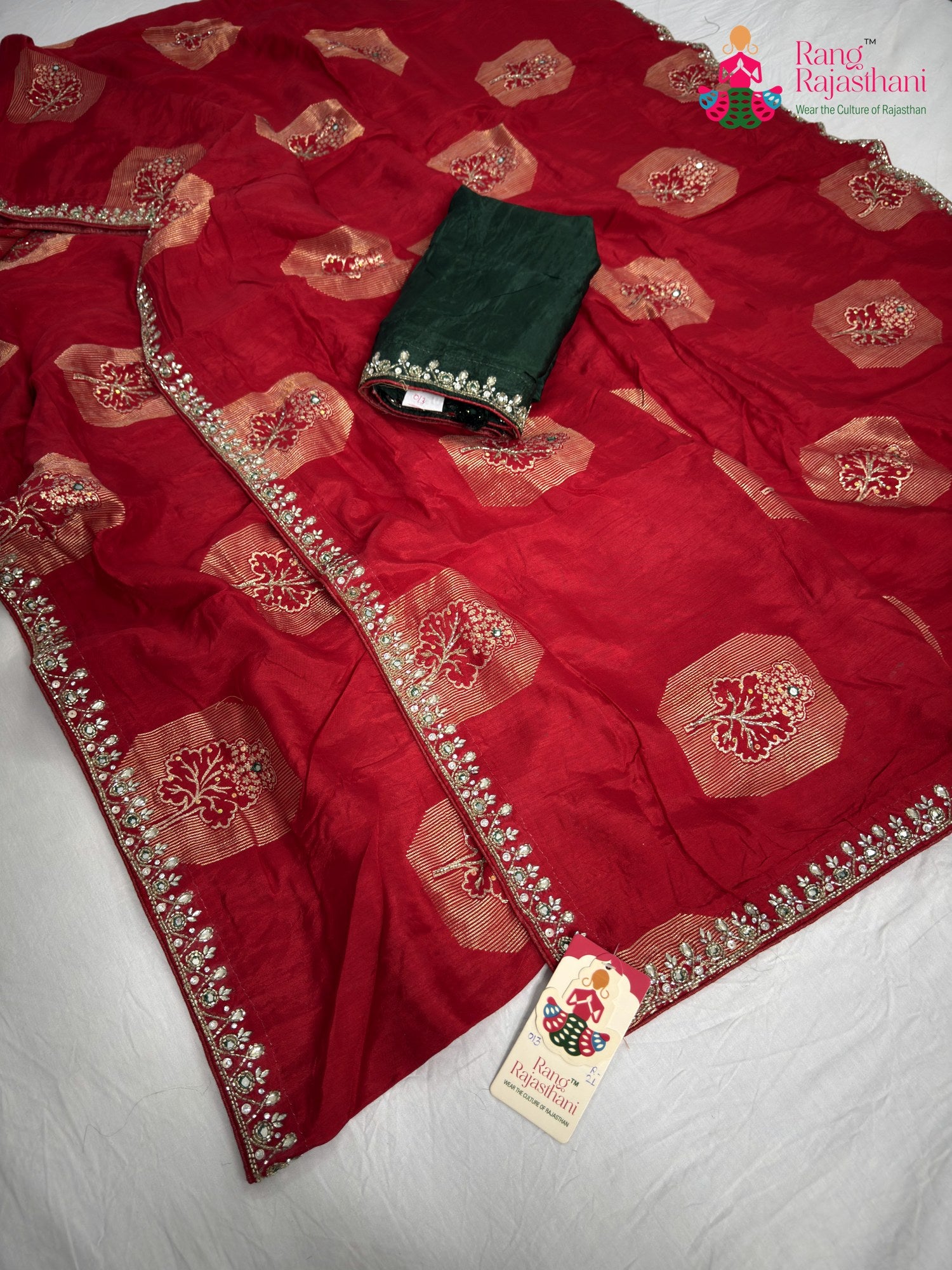 close up detailing of red pure russian silk hand embellishment saree