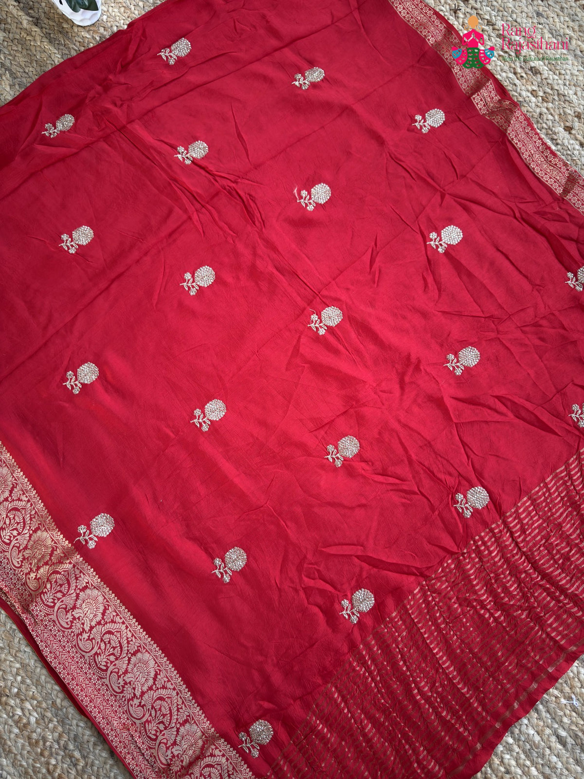 pallu detailing of red pure russian silk zari embroidery saree
