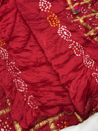 close up view of red russian silk bandhani gharchola saree