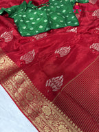 border detailing of red silk saree