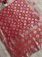 pallu detailing of red soft georgette banarasi zari weave gharchola saree