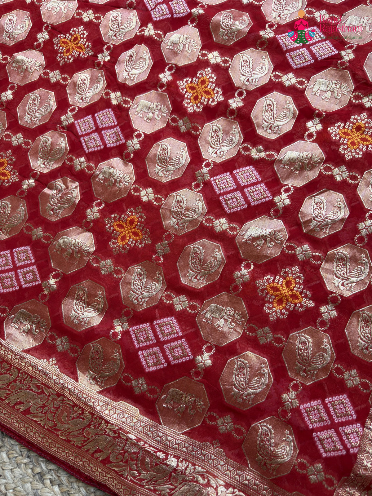 design pattern of red soft georgette banarasi zari weave gharchola saree