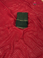 pallu detailing of red soft georgette banarasi zari weave saree
