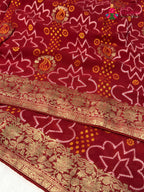 design pattern of red soft georgette bandhani saree