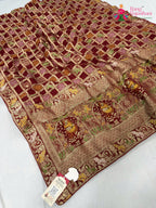 close up detailing of red soft georgette bandhani saree