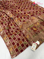 border detailing of red soft georgette bandhani saree
