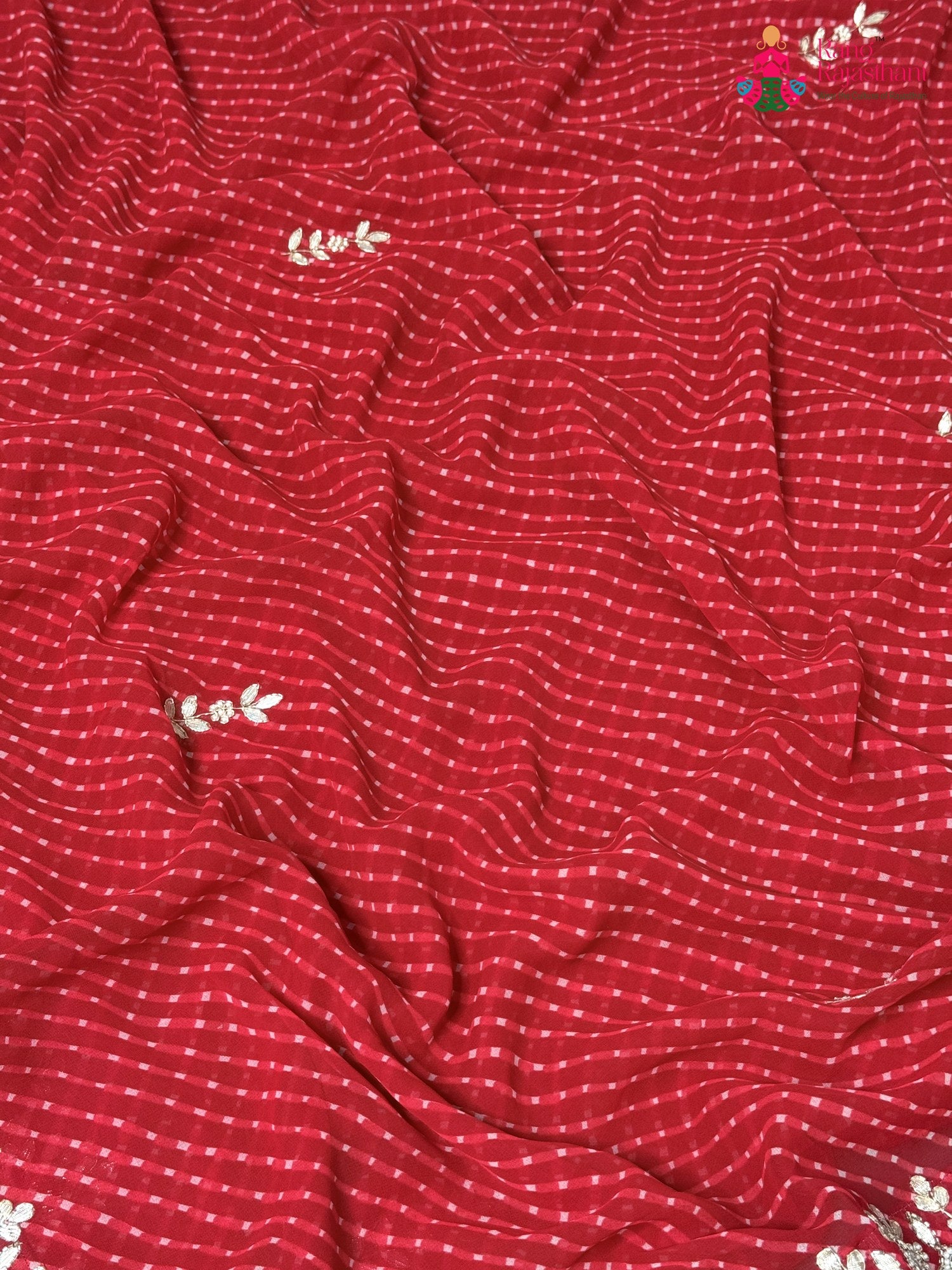 close up detailing of red soft georgette gota patti saree