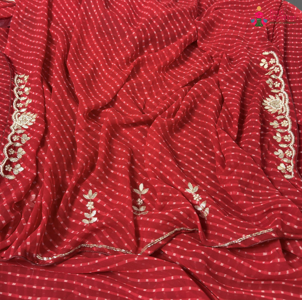 border detailing of red soft georgette gota patti saree