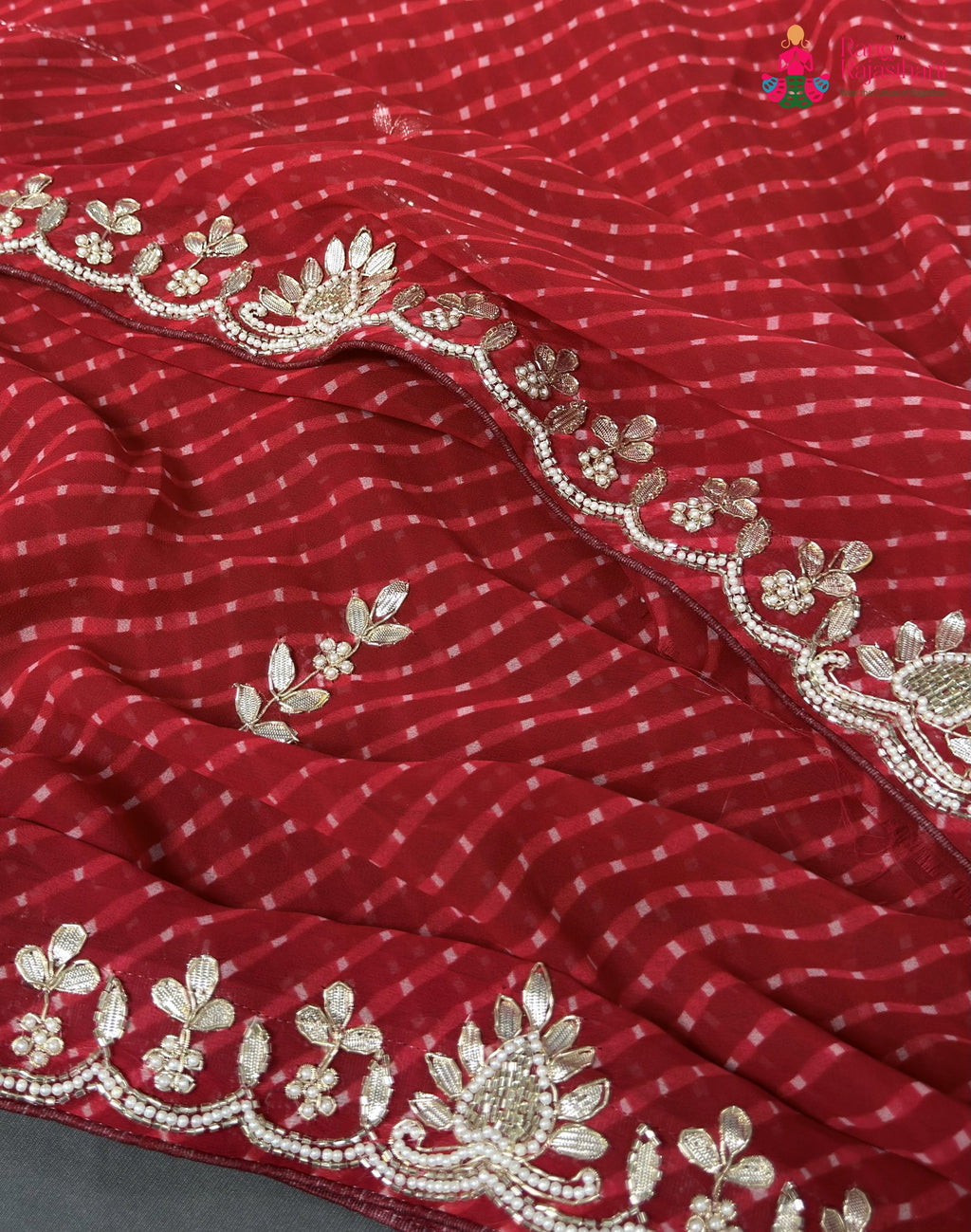 fabric texture of red soft georgette gota patti saree