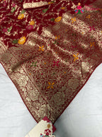 pallu detailing of red soft georgette meenakari zari saree