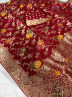 close up detailing of red soft georgette meenakari zari saree