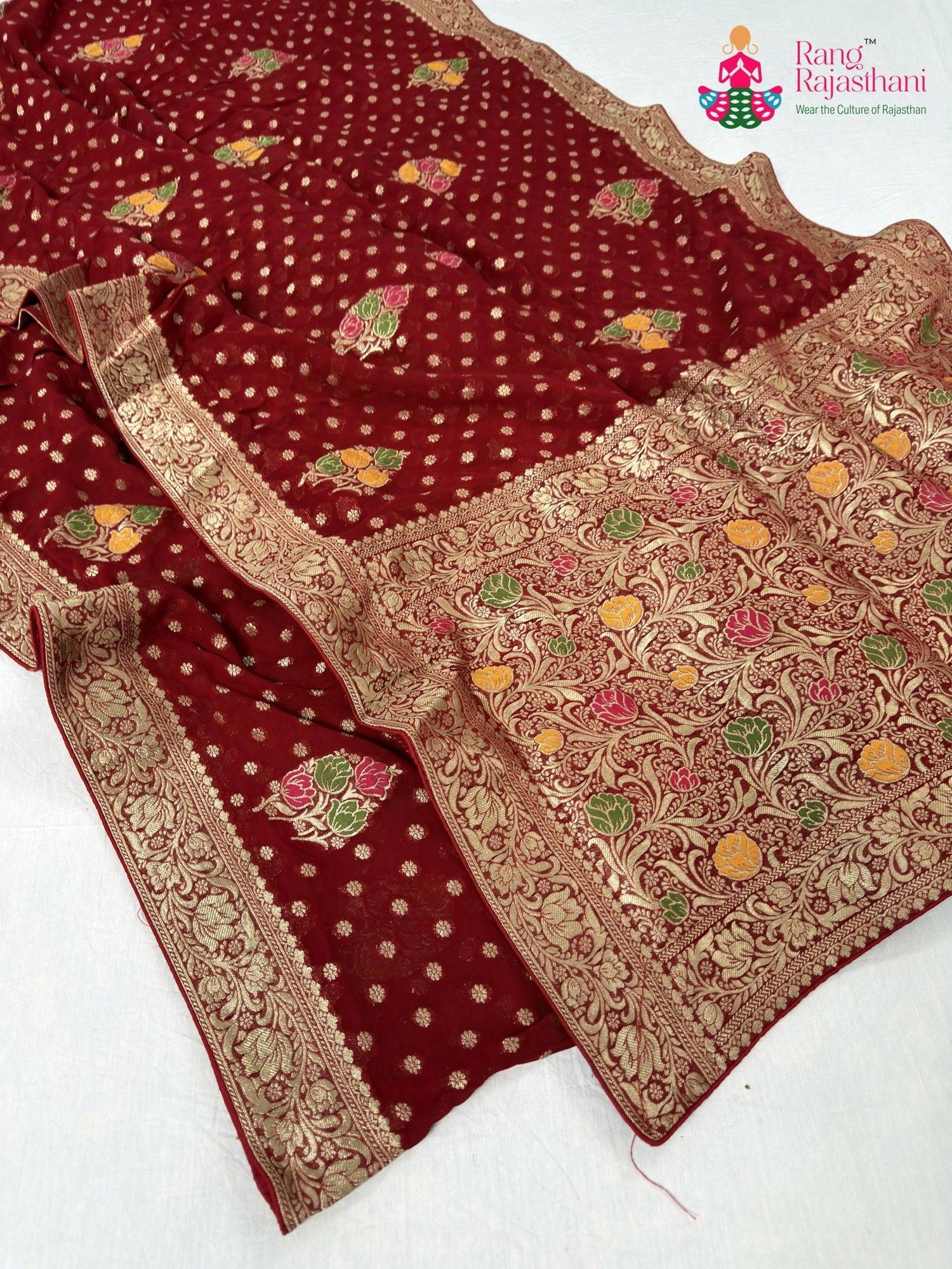 border detailing of red soft georgette meenakari zari saree