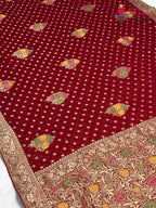pallu detailing of red soft georgette meenakari zari saree