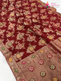 pallu detailing of red soft georgette meenakari zari saree