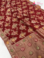pallu detailing of red soft georgette meenakari zari saree