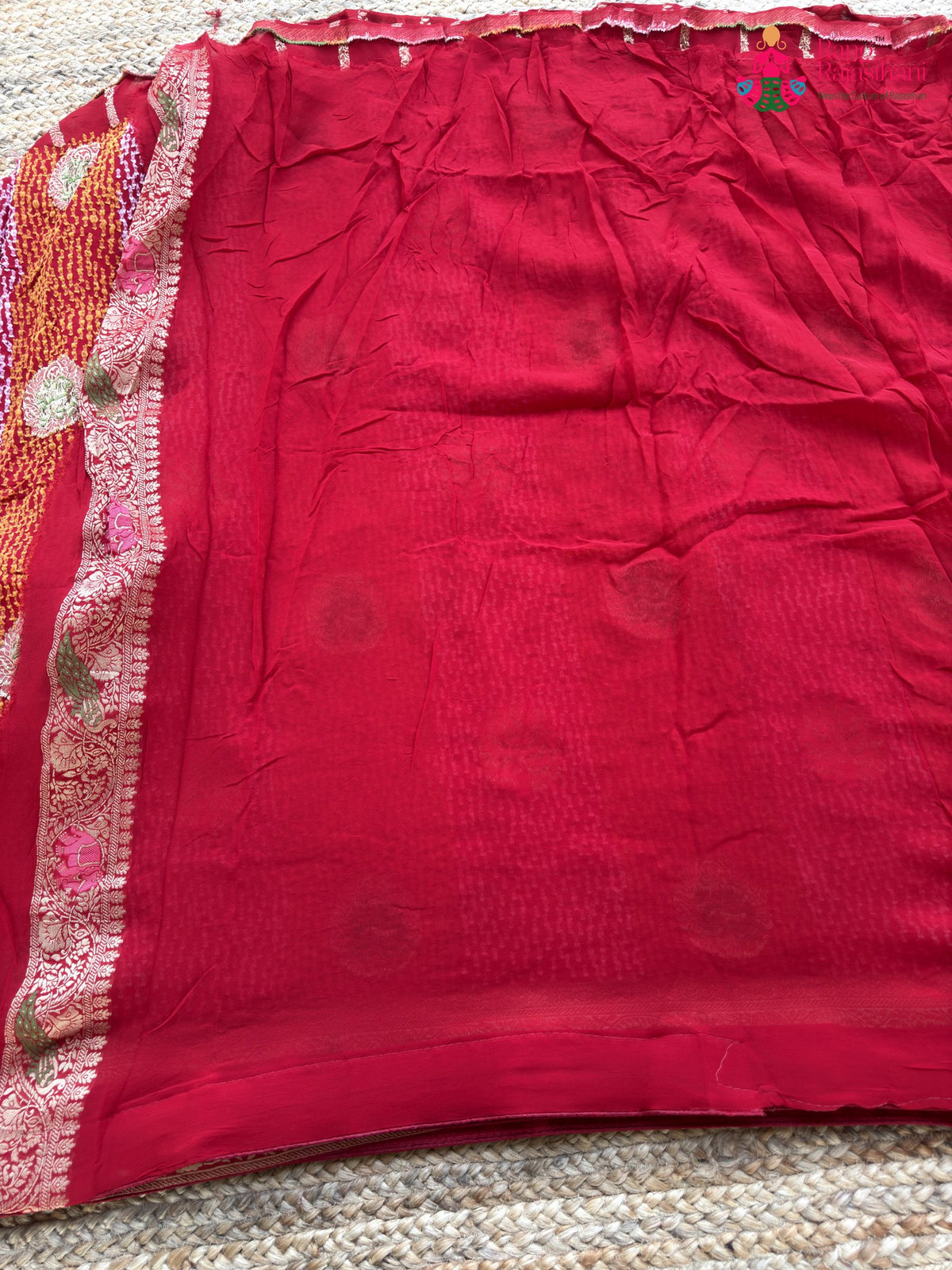 close up view of red soft georgette meenakari zari saree