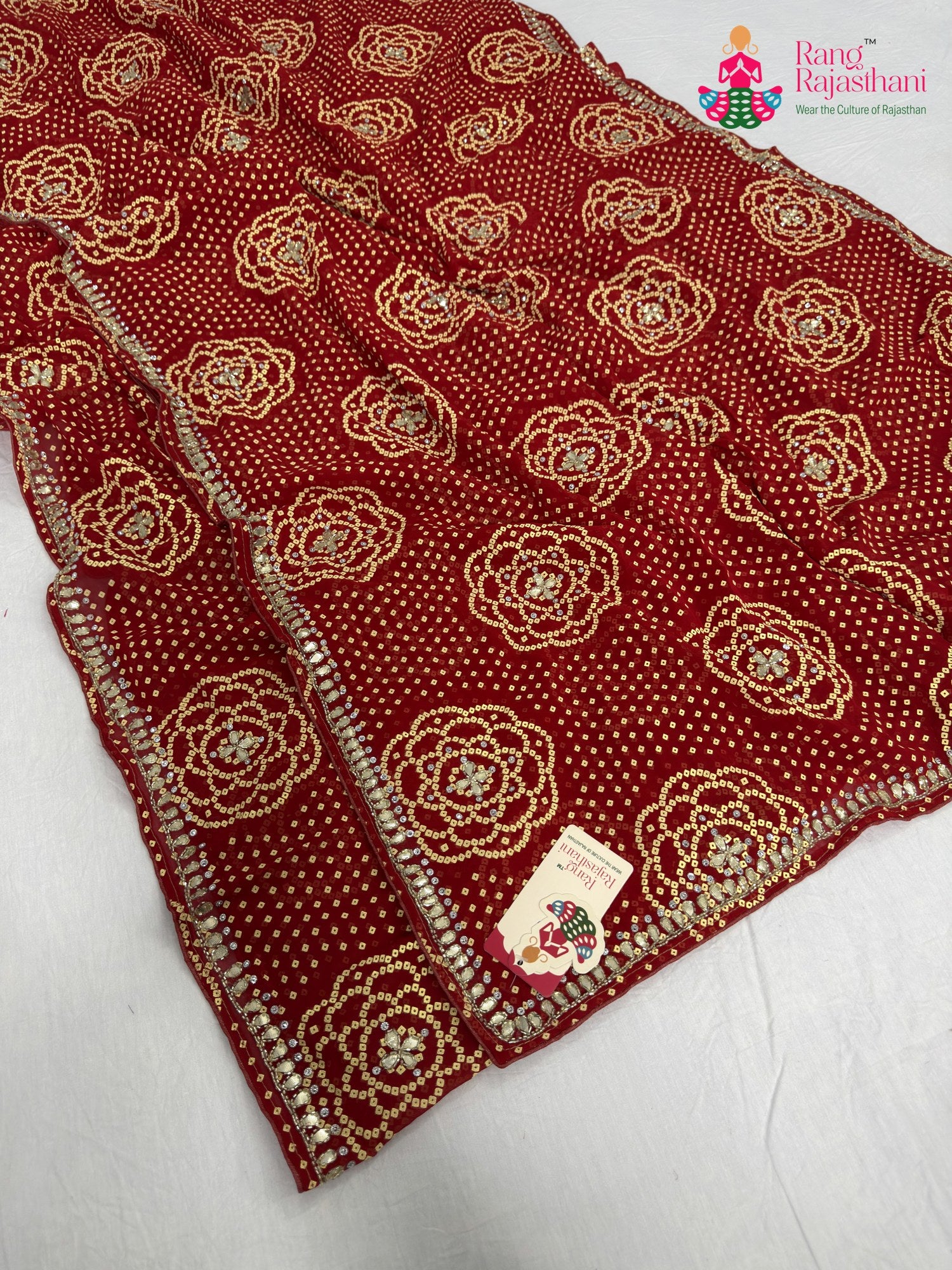 complete look of red synthetic bandhani saree
