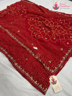 pallu detailing of red synthetic bandhani saree