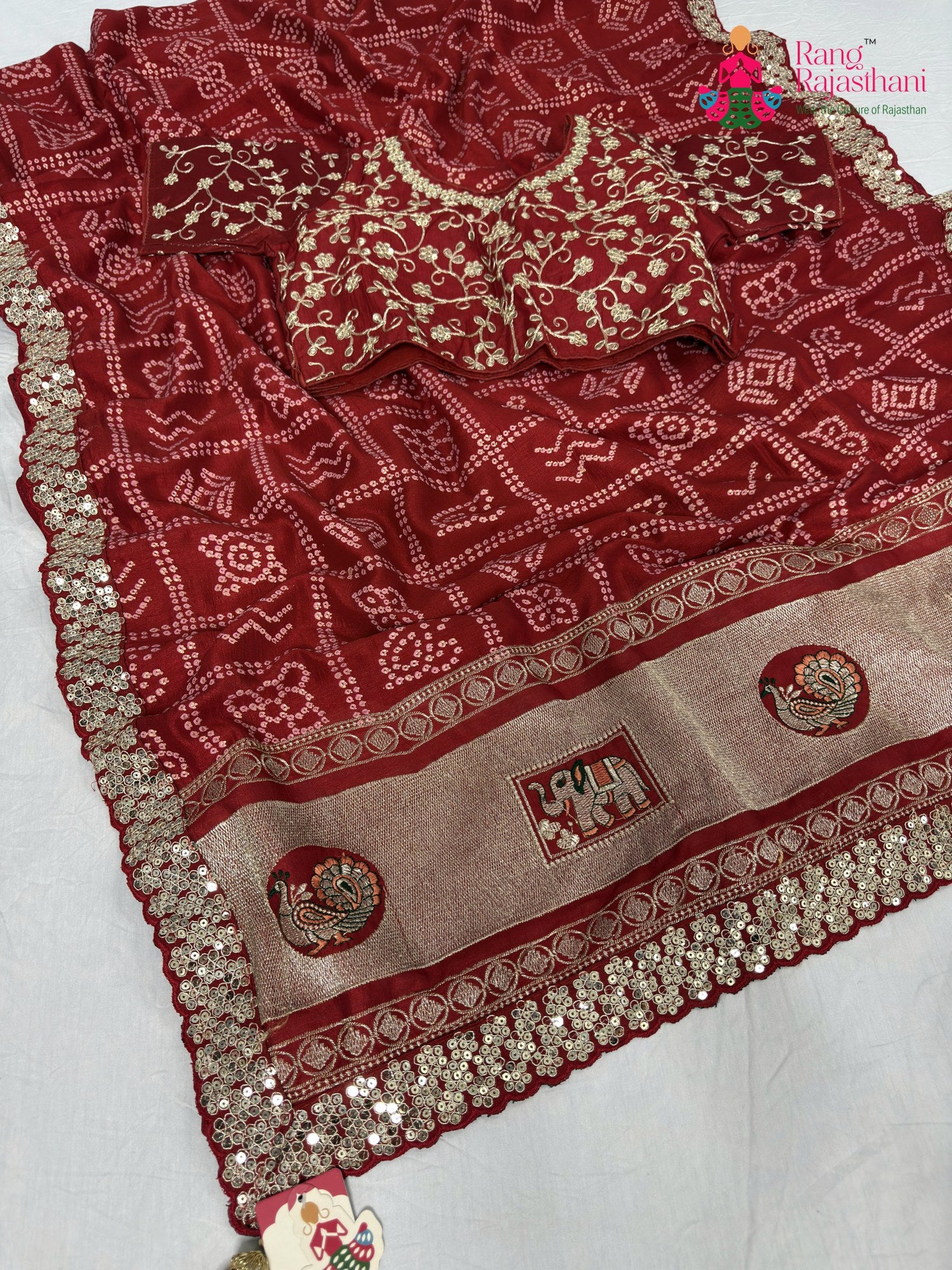 red synthetic zari embroidery saree for mayra ceremony by Rang Rajasthani