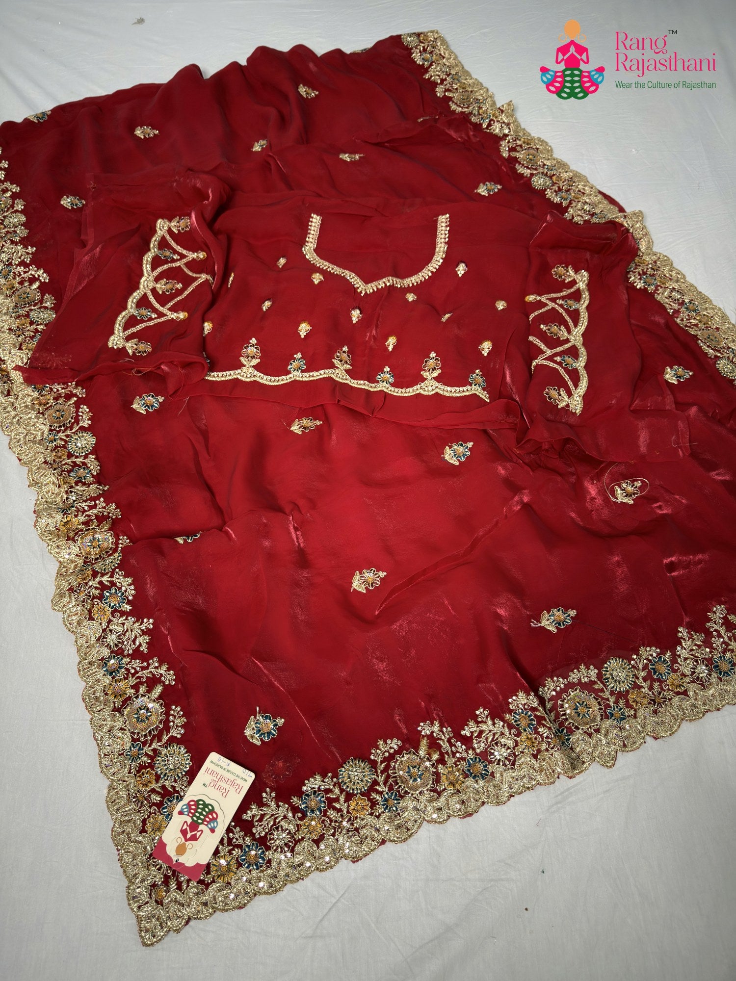 red synthetic zari embroidery saree for wedding reception by Rang Rajasthani