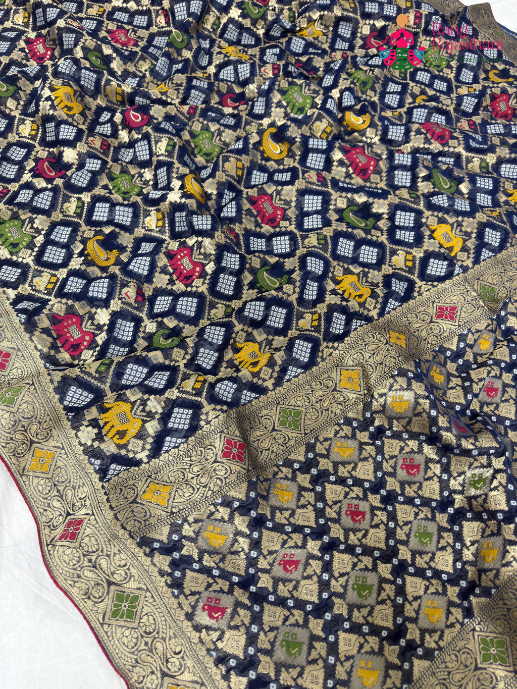 fabric texture of royal blue pure georgette khaddi saree
