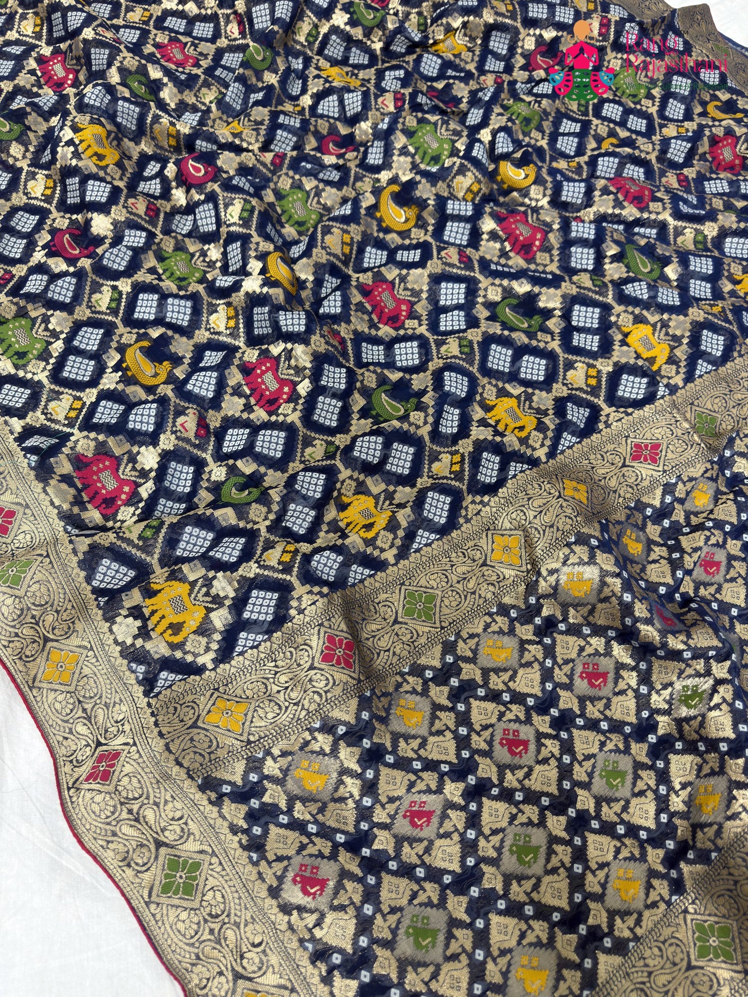 fabric texture of royal blue pure georgette khaddi saree