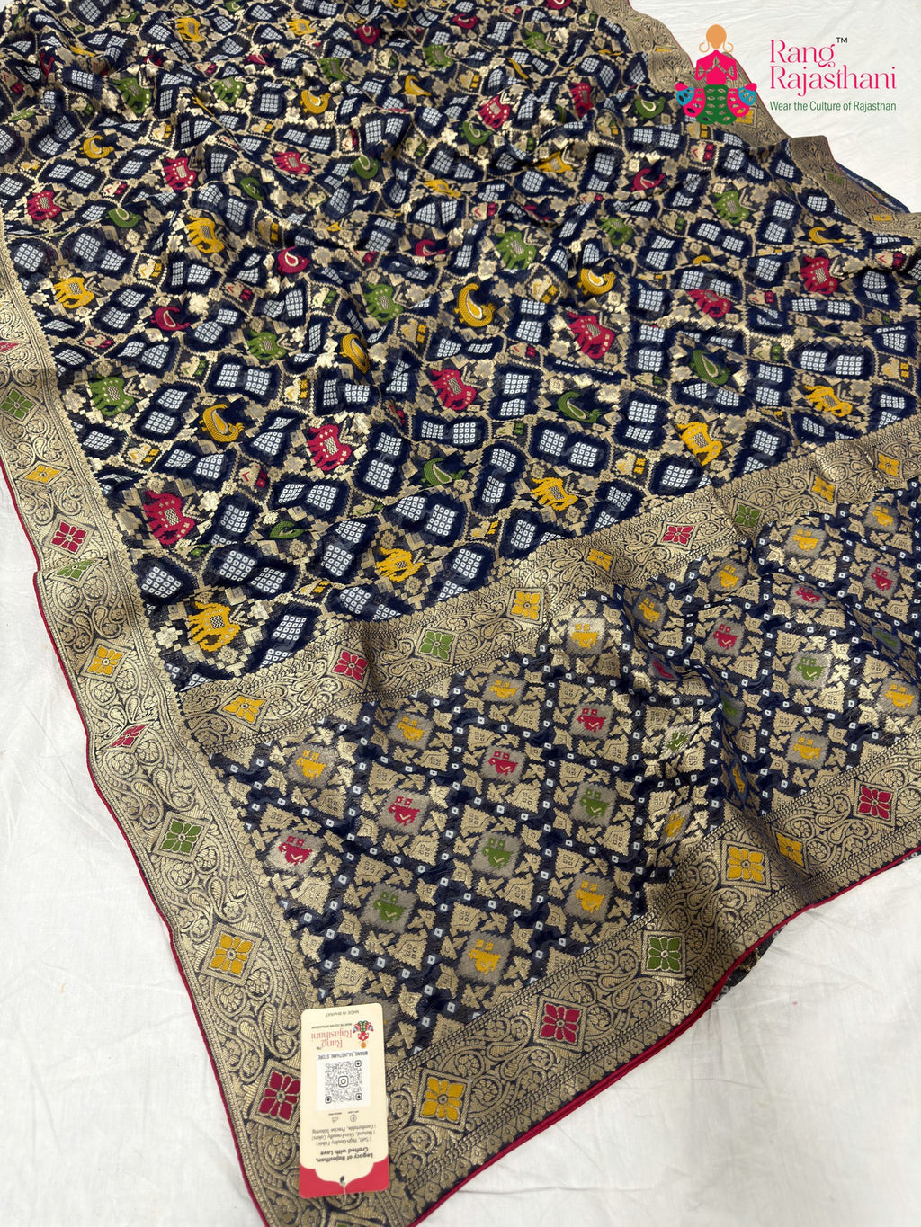 border detailing of royal blue pure georgette khaddi saree
