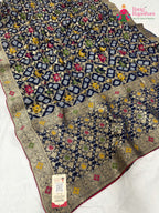 border detailing of royal blue pure georgette khaddi saree