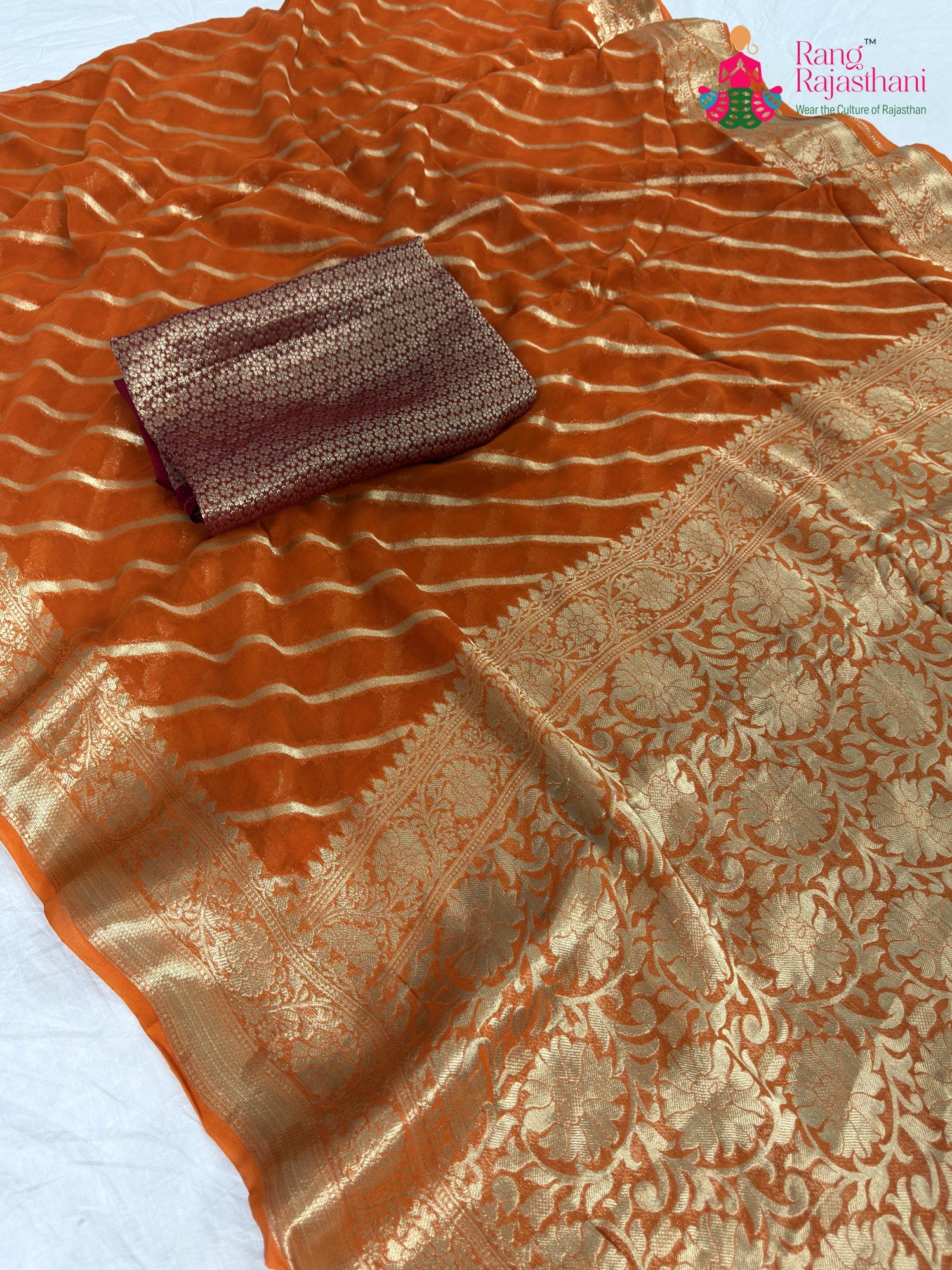 fabric texture of rust pure georgette khaddi saree