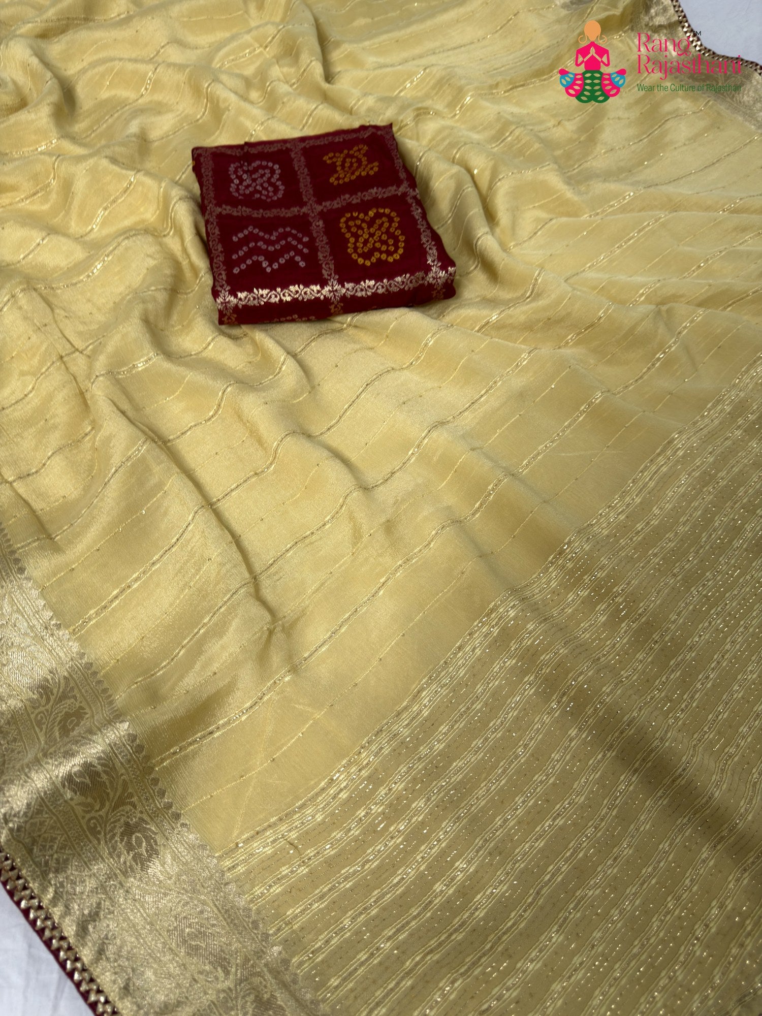 fabric texture of soft cream fabric saree