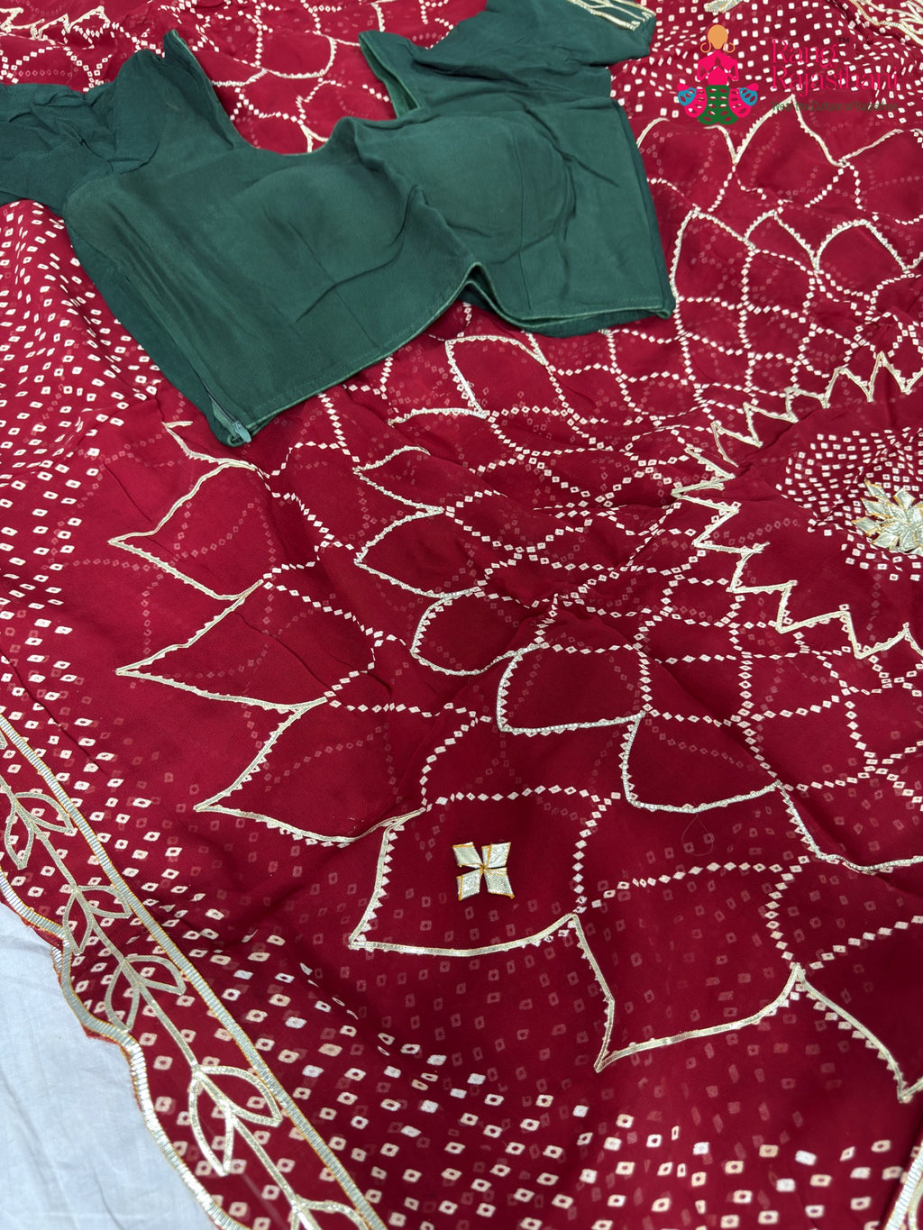 fabric texture of soft red fabric saree
