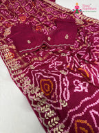 fabric texture of soft red fabric saree
